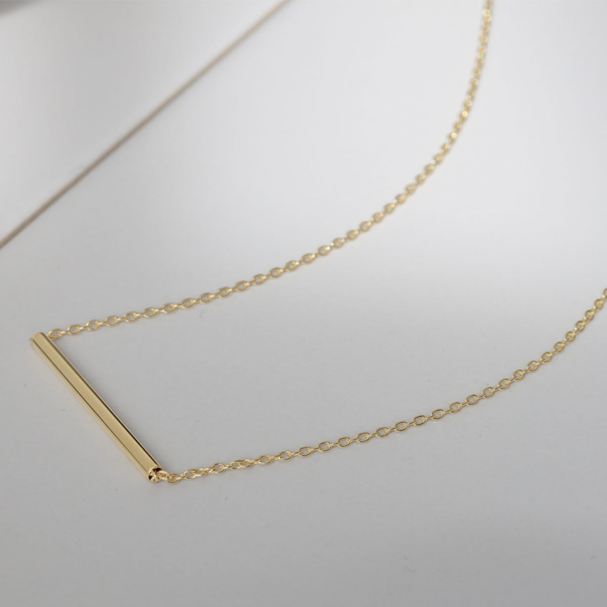 Thin gold bar on sale necklace